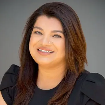 Radhika Sharma, Agent in  - Compass