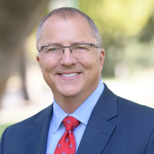 Tim McGuire, Agent in  - Compass