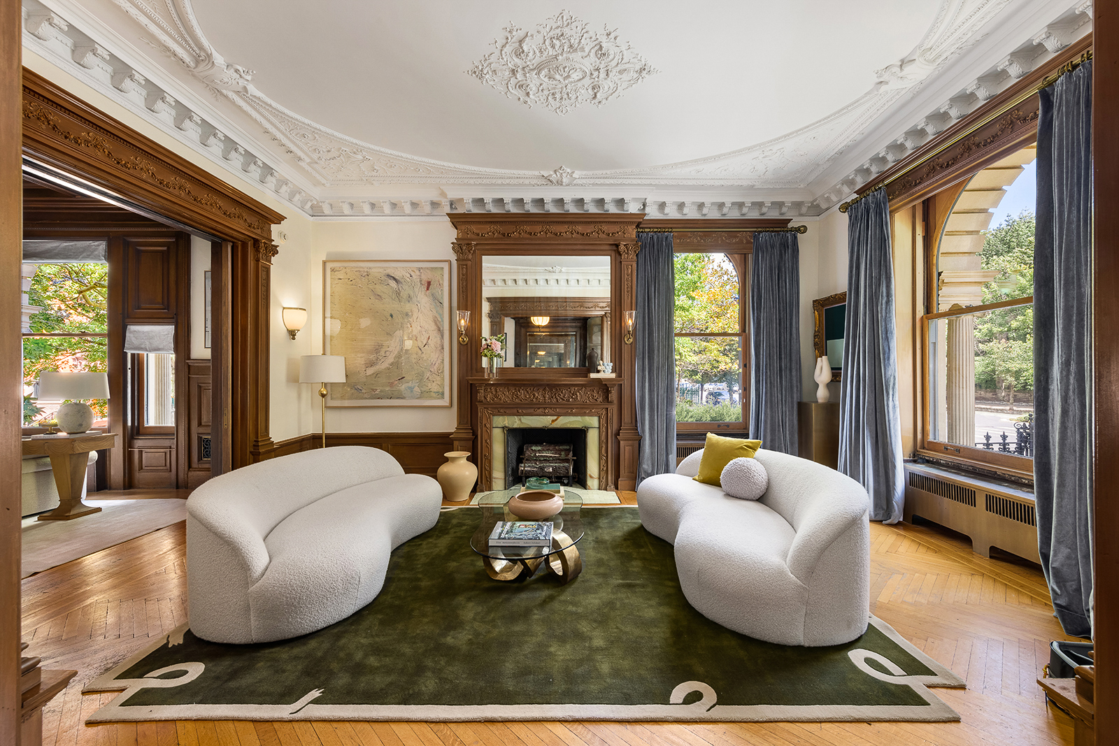 A living room with a couch, chair, and table