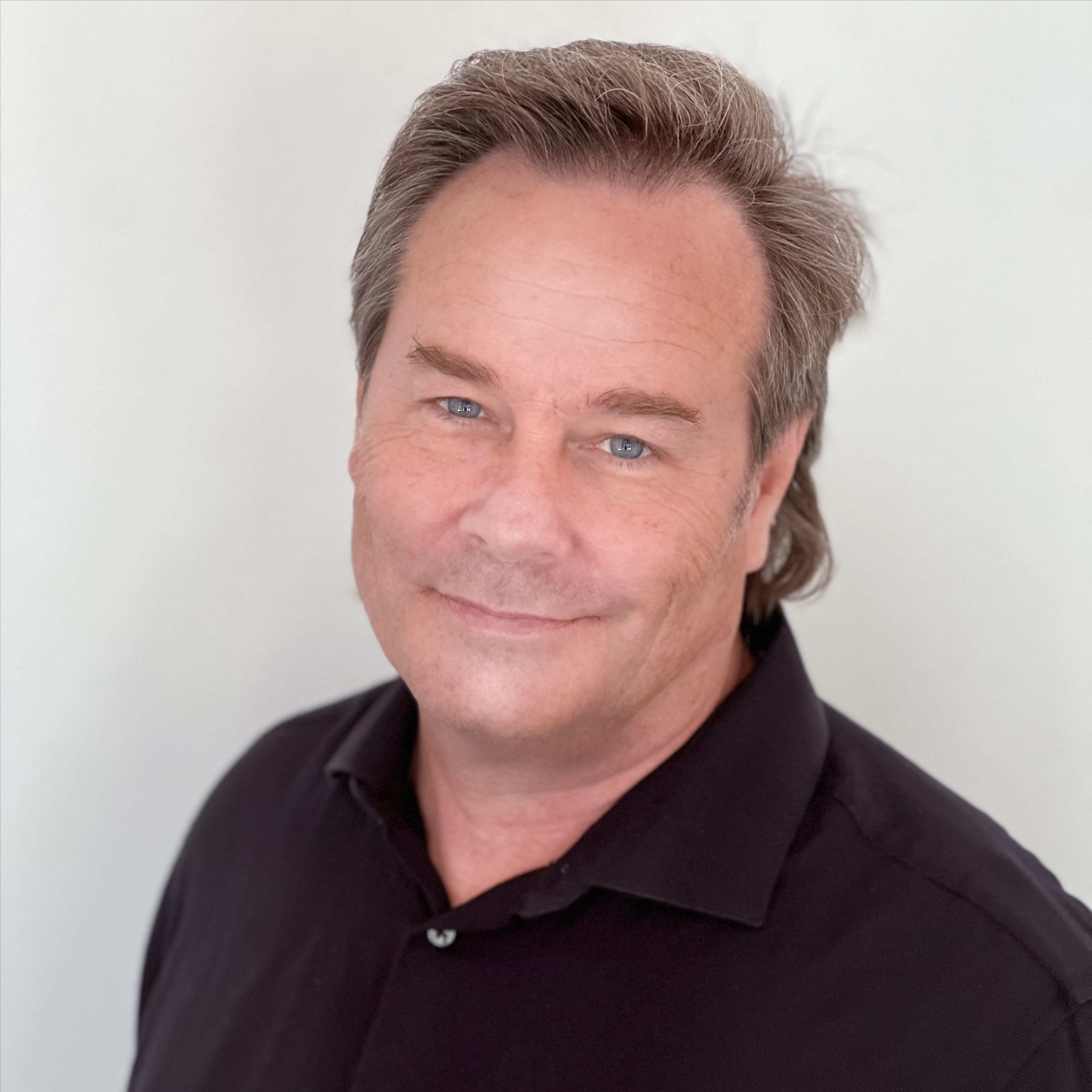 Headshot of John Thompson