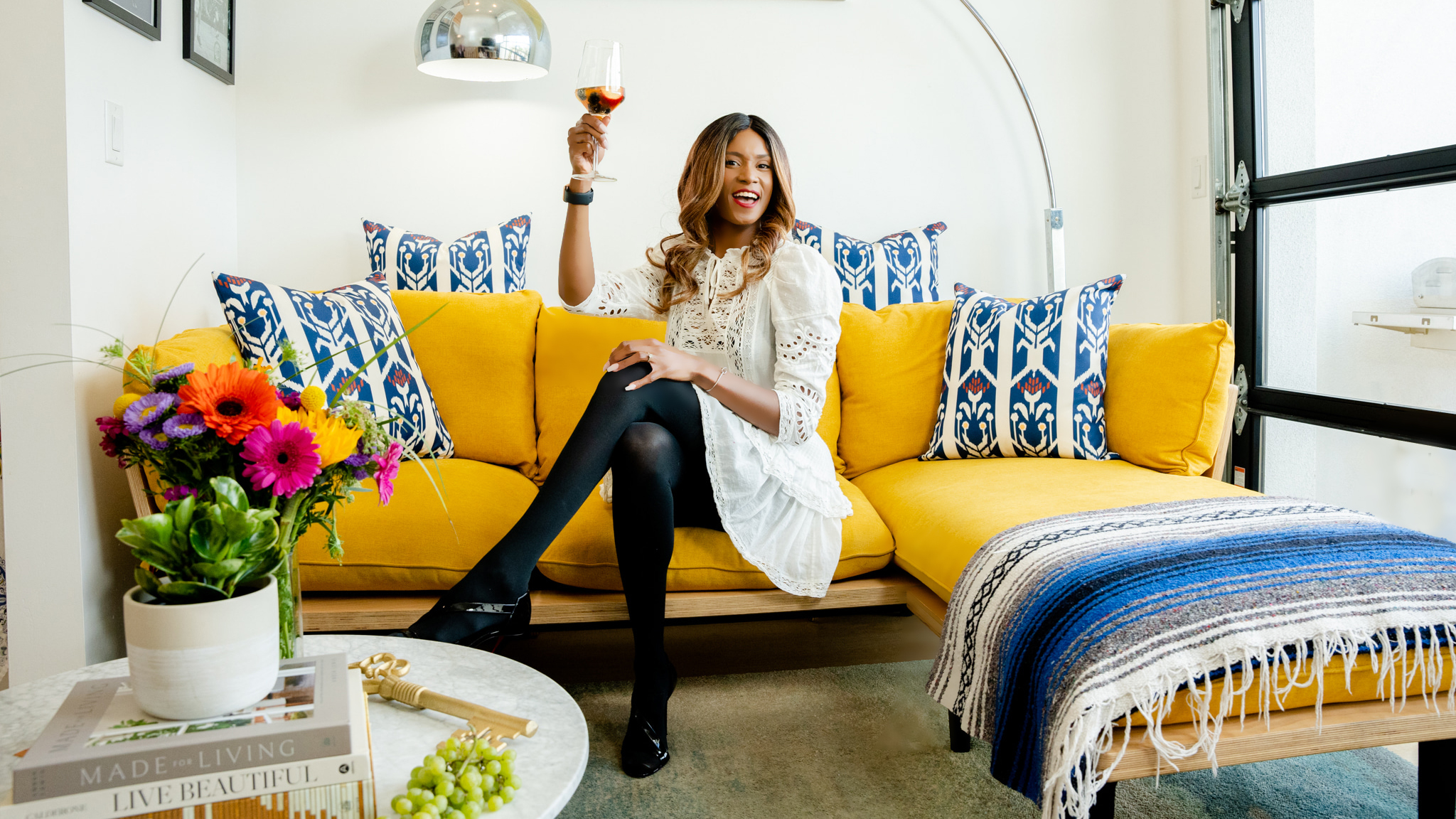 A woman sitting on a couch in a room