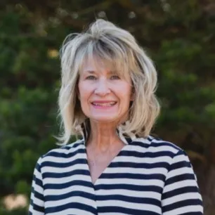 Suzi Bussacco, Agent in  - Compass