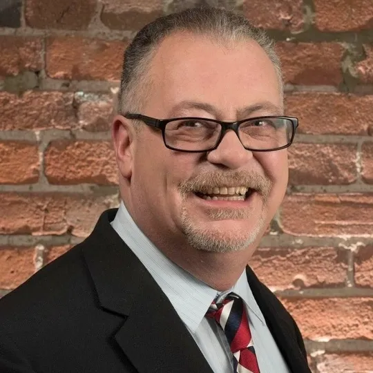 Joe Quigley, Agent in  - Compass