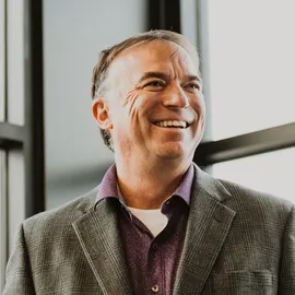 Eric Breslin, Agent in  - Compass