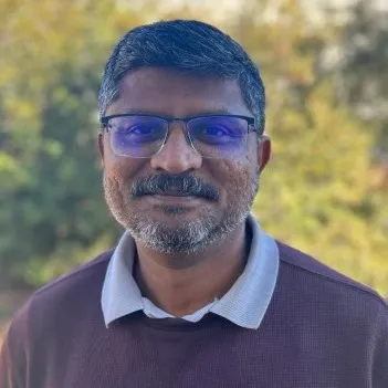 Ron Ramanujam, Agent in  - Compass