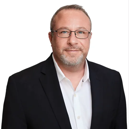 Guy Koret, Agent in  - Compass