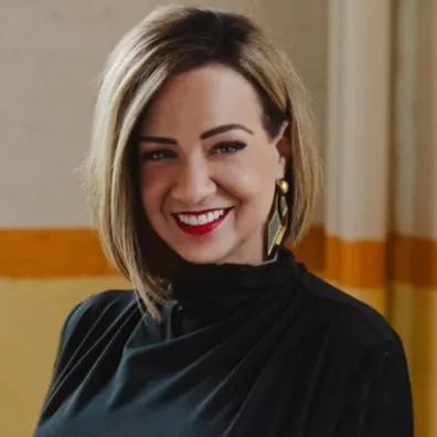 Kristin McFeely, Agent in  - Compass