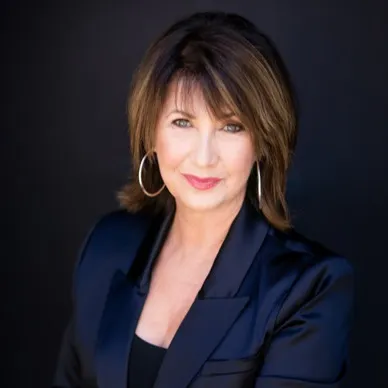 Laurie McClain, Agent in  - Compass