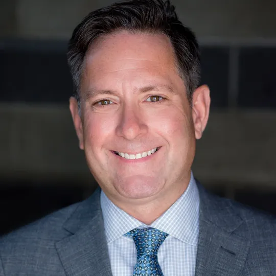 Chris Norton, Agent in  - Compass