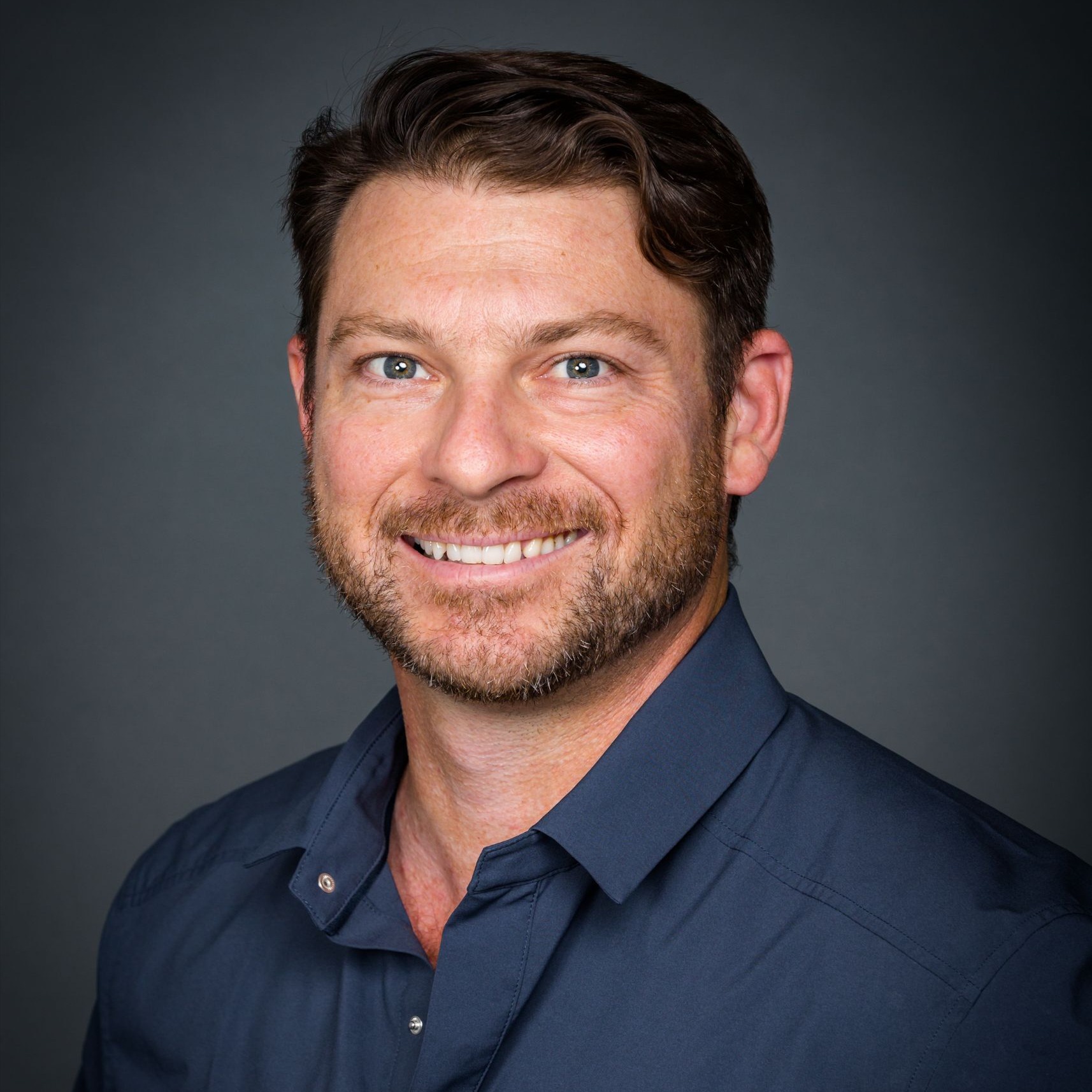 Headshot of John Zisa