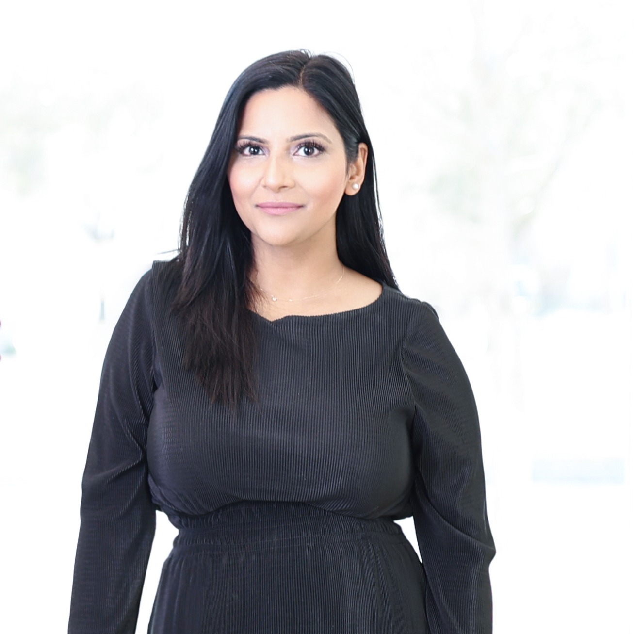 Headshot of Beena Momin