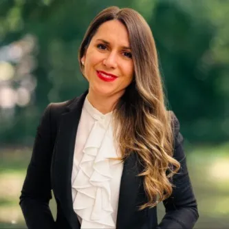 Tila Tsavegias, Agent in  - Compass