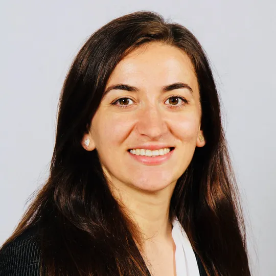 Alda Kapllani, Agent in  - Compass