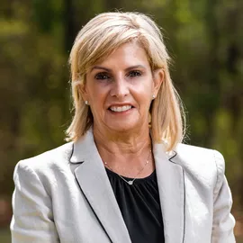Carol Minghenelli, Agent in  - Compass