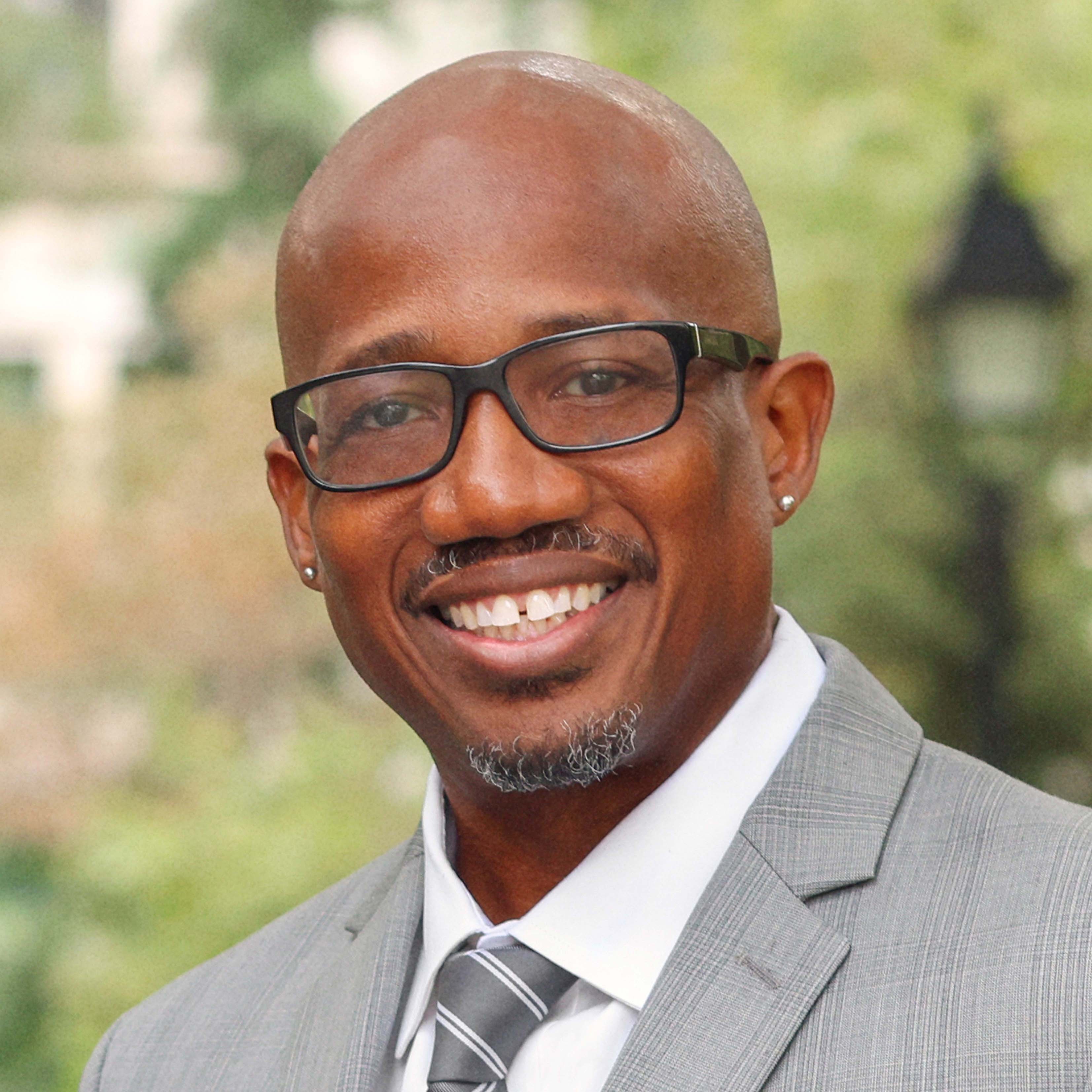 Headshot of Malcolm Louis Adams