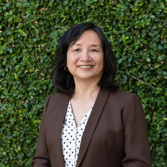 Delia Fei, Agent in  - Compass