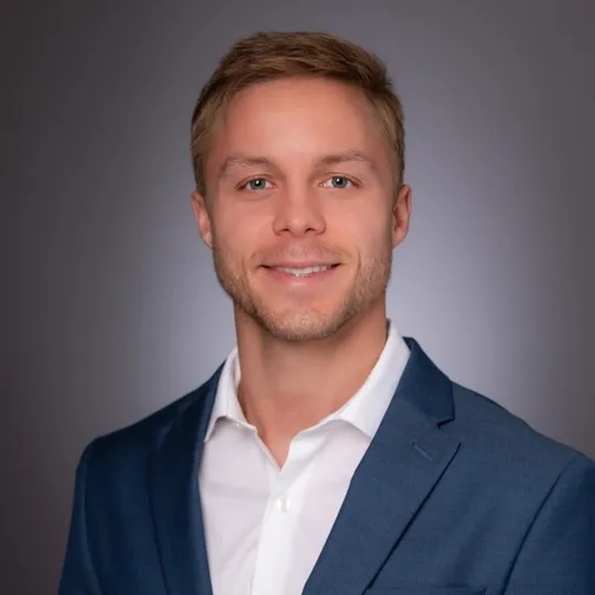 Justin Ratzlaff, Agent in  - Compass