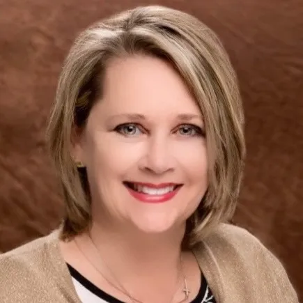 Cameron Tucker, Agent in  - Compass