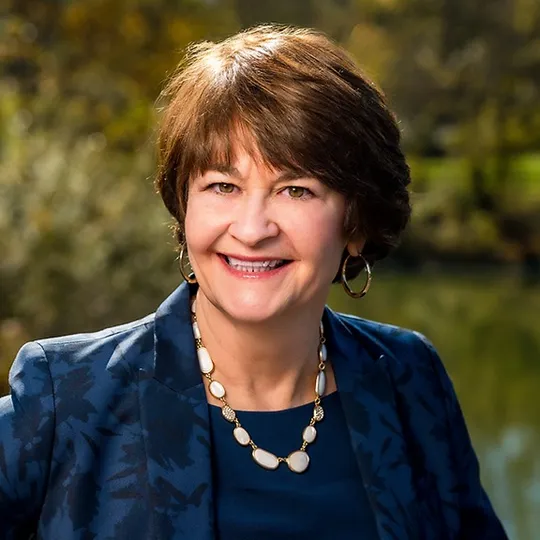 Kathleen Revelle, Agent in  - Compass