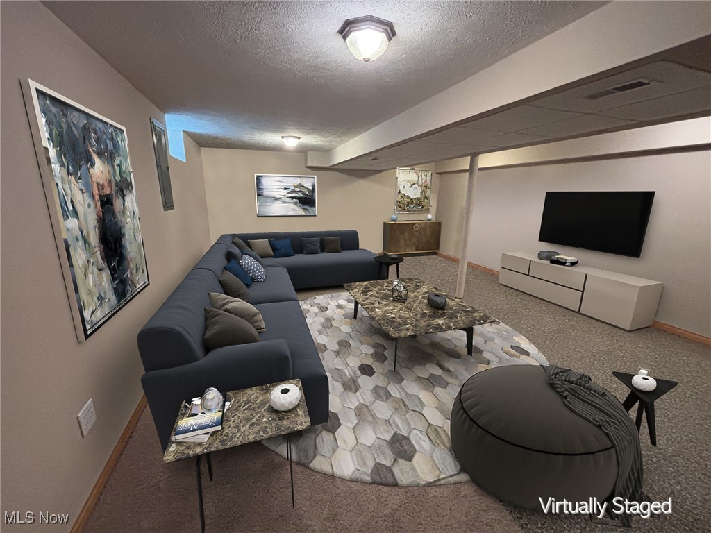 30895 Harrison Road Wickliffe, OH 44092 - Photo 20 of 23 Recreation room with natural stone floor.