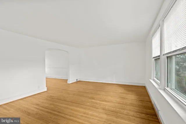 a view of an empty room and window