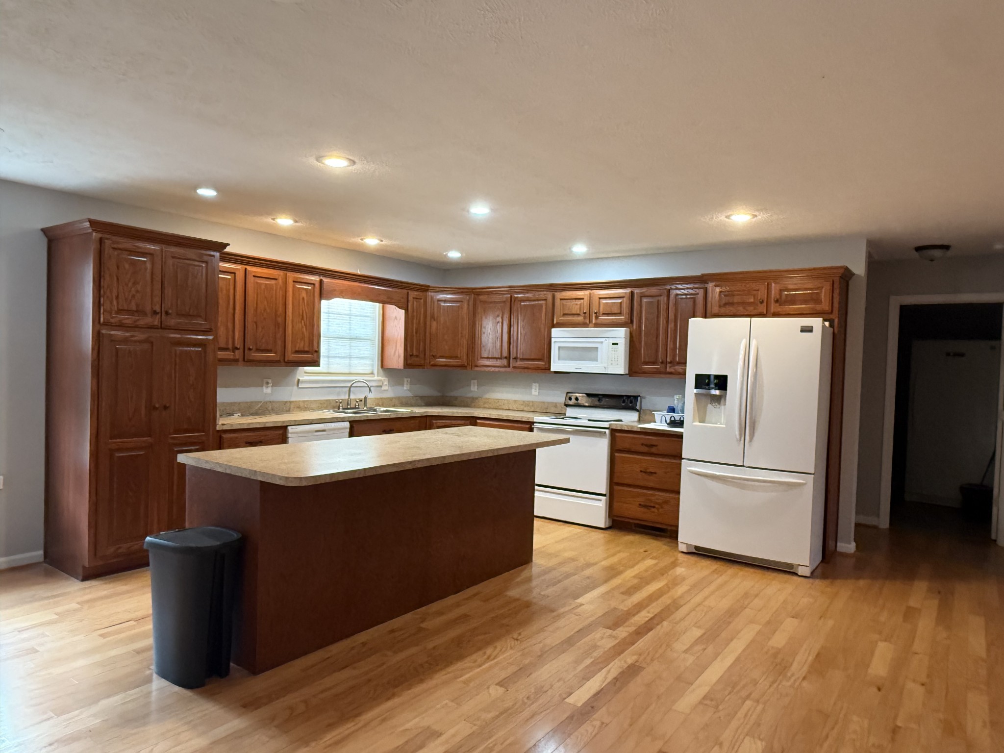 4205 Browning Branch Road Bethpage, TN 37022 - Photo 15 of 29 a large kitchen with stainless steel appliances granite countertop a refrigerator and a stove top oven