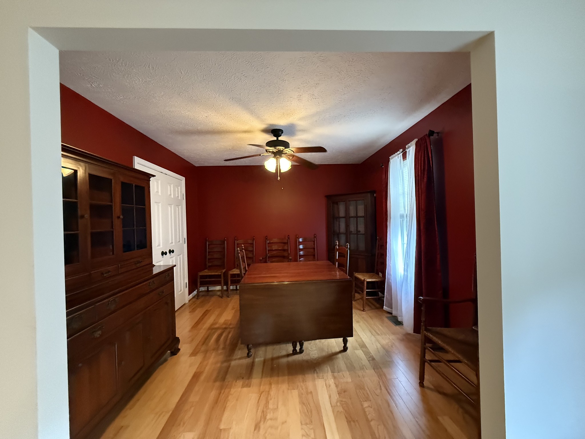 4205 Browning Branch Road Bethpage, TN 37022 - Photo 17 of 29 a living room with furniture and a chandelier