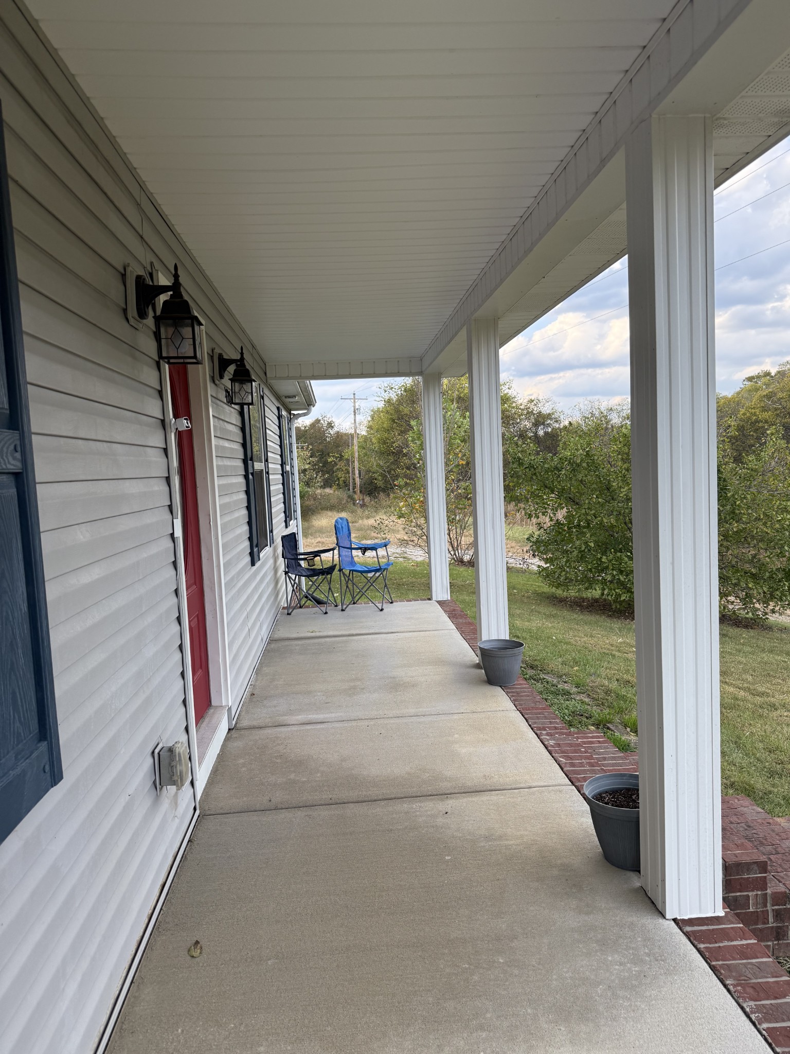 4205 Browning Branch Road Bethpage, TN 37022 - Photo 6 of 29 a view of a porch with wooden floor and outdoor space