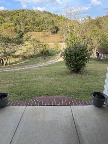 a view of a road with an ocean view