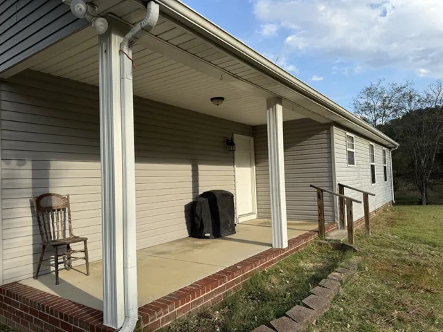 a view of a back yard of the house