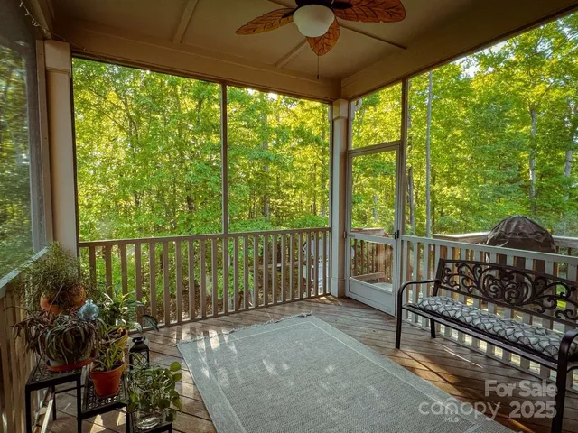 a kitchen with granite countertop a refrigerator stove top oven and sink