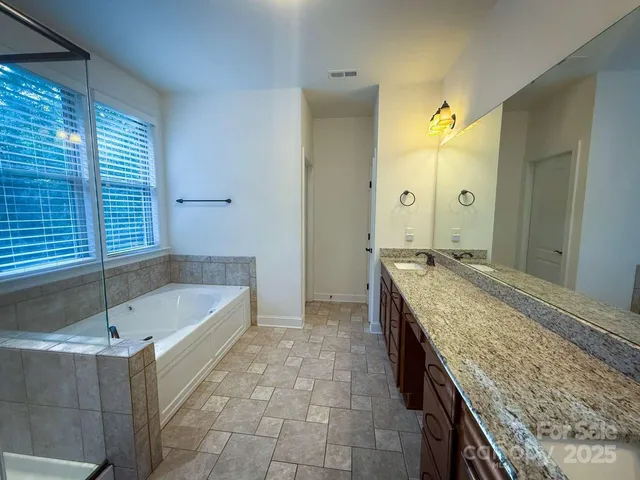 a view of a yard in front of the house