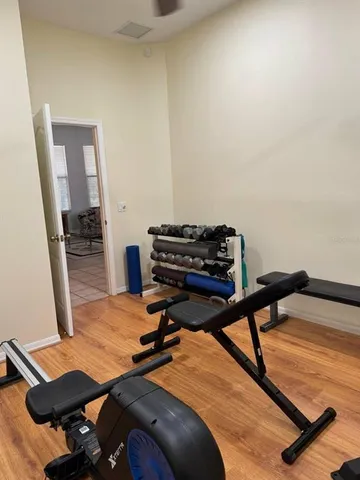 a view of a garage with rack and bicycle