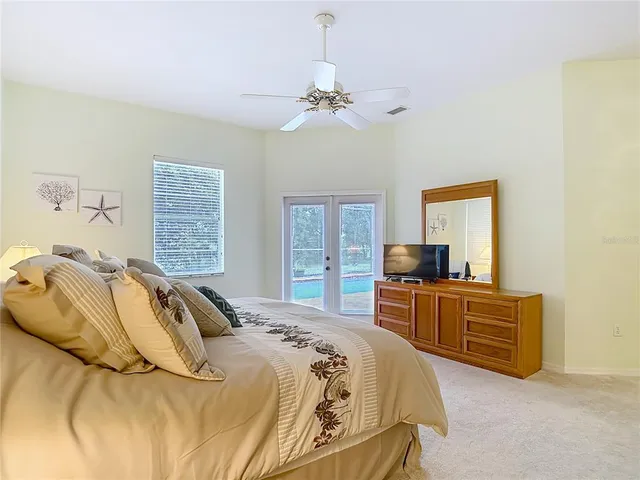 a living room with furniture and a yard