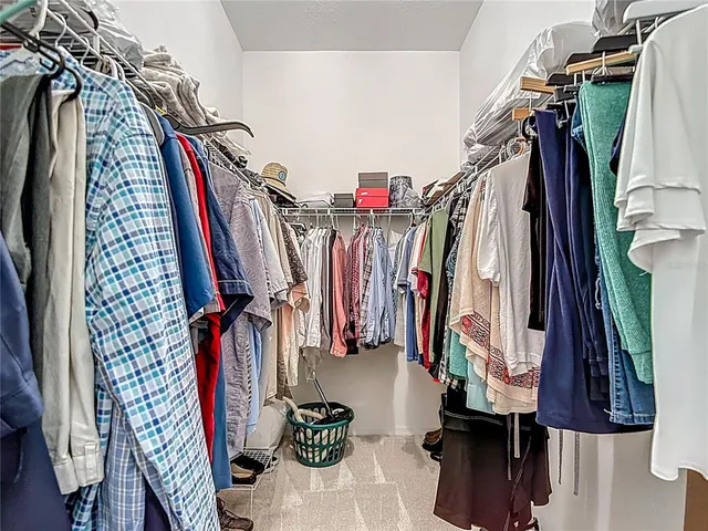 a view of a house with a yard and garage