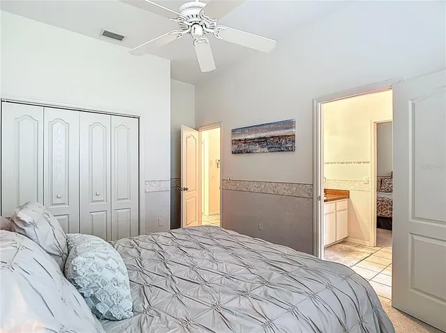 a view of swimming pool outdoor seating and city view