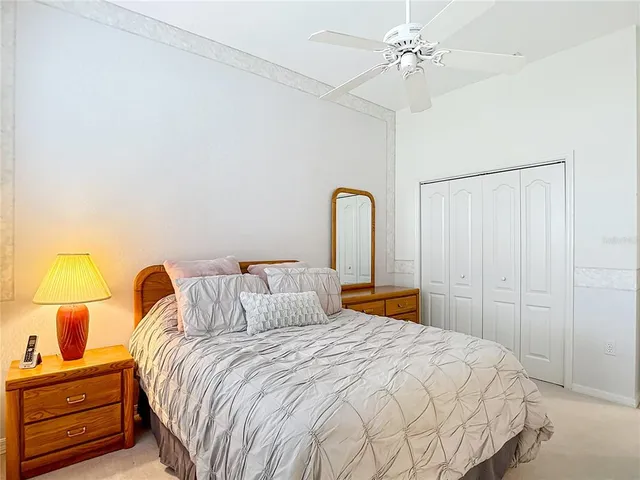 an aerial view of a house with a garden and swimming pool