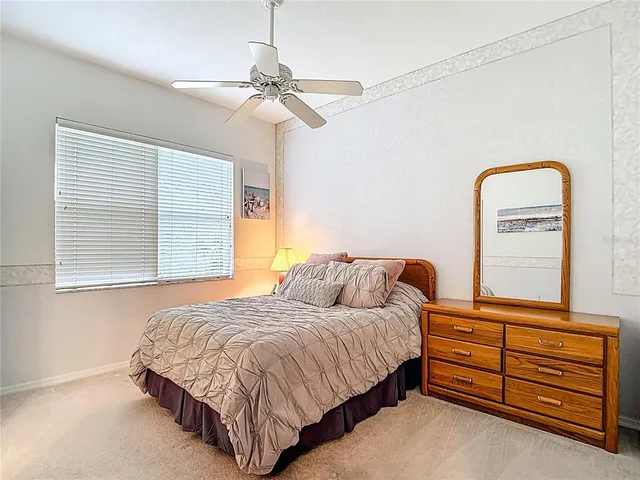 a view of a golf course with a lake