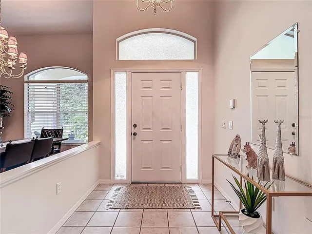 a kitchen with stainless steel appliances granite countertop a refrigerator sink and cabinets