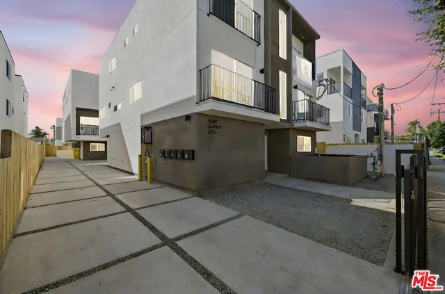 a view of a street with buildings