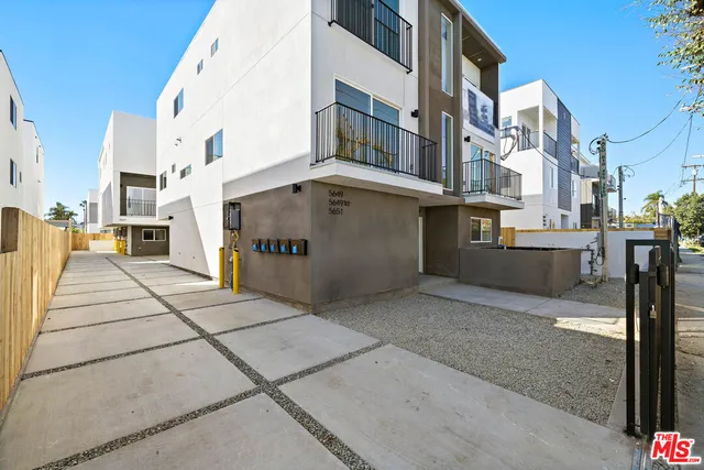 a kitchen with a refrigerator sink and microwave