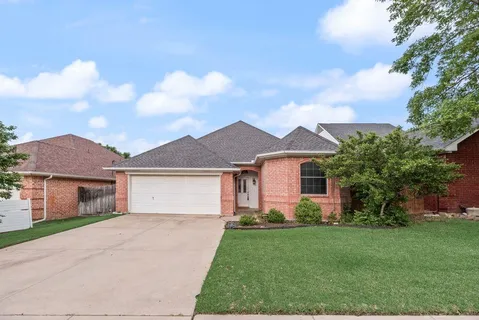 front view of a house and a yard