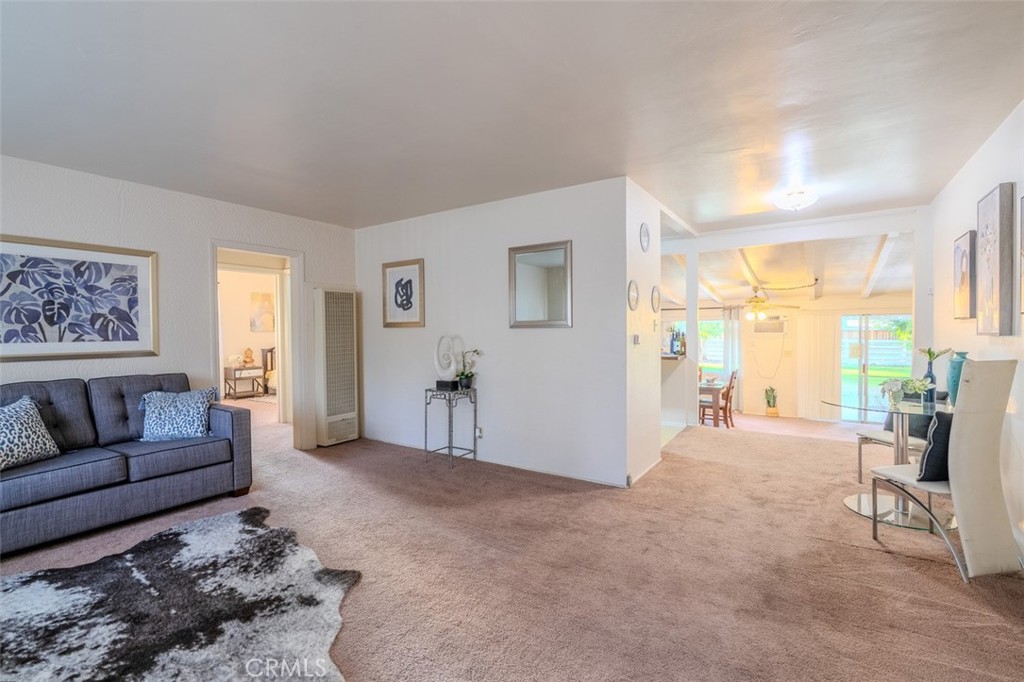 7859 Sycamore Avenue Riverside, CA 92504 - Photo 5 of 29 a living room with furniture and a window