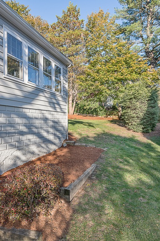 46 Allen Road Winchester, MA 01890 - Photo 27 of 29 a view of a yard in front of a house