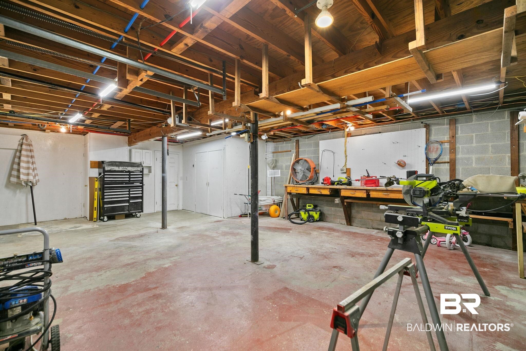14 Lee Circle Daphne, AL 36527 - Photo 59 of 83 Basement featuring a workshop area