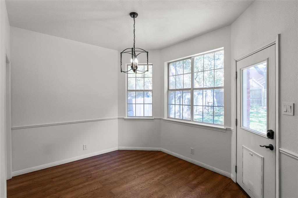 3901 Caney Creek Road Austin, TX 78732 - Photo 8 of 18 Breakfast dining features a wall of windows which add to the natural light.