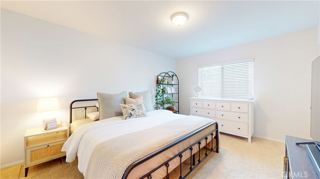 1279 Longbranch Road San Jacinto, CA 92582 - Photo 19 of 35 a bedroom with a bed and a cabinets
