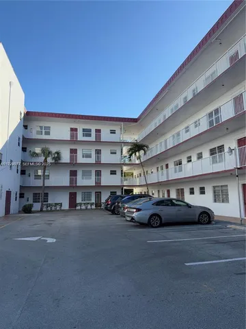 a car parked in front of a building