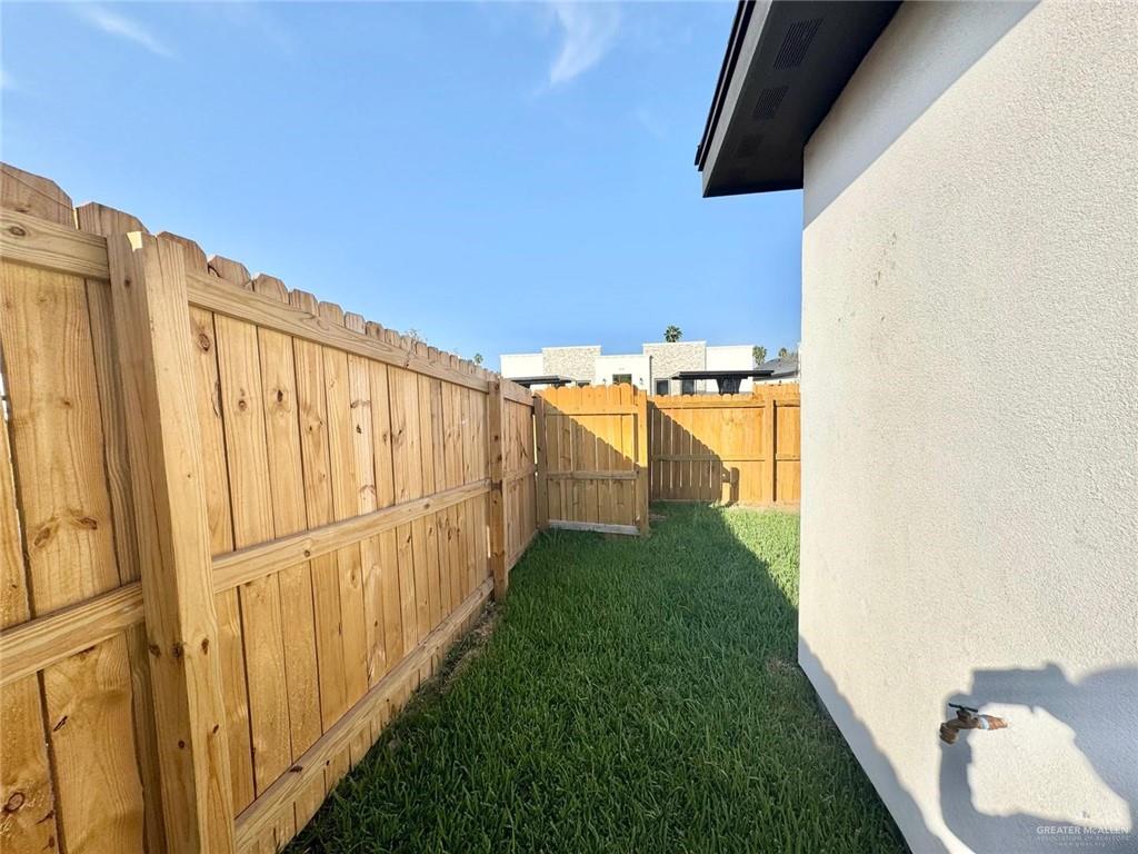 2103 Selena Street, Unit 4 Mission, TX 78572 - Photo 7 of 15 a view of a back yard