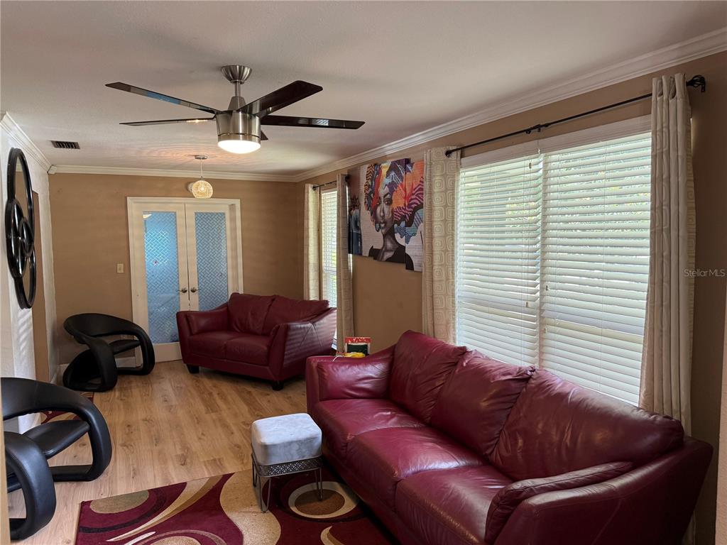 7713 Southwest 8th Avenue Gainesville, FL 32607 - Photo 11 of 32 a living room with furniture and a window
